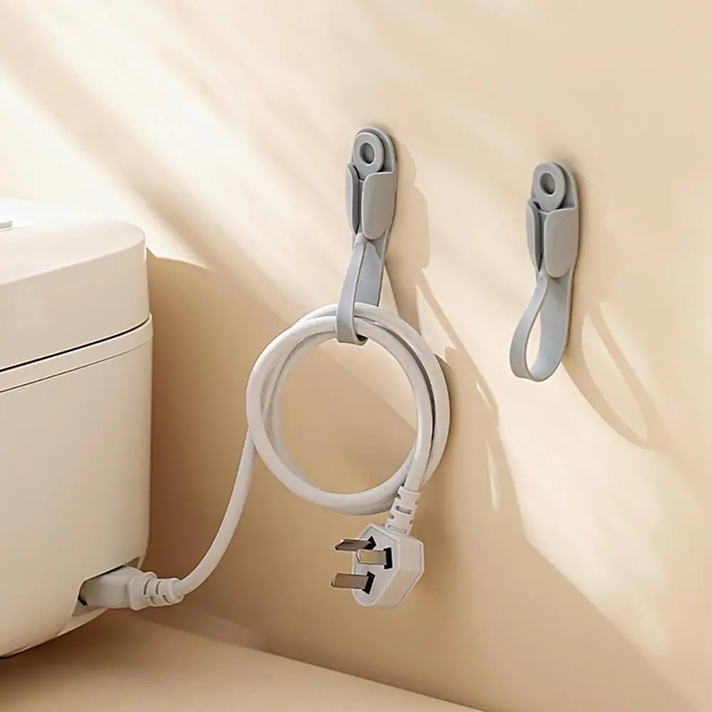 🎄Wall Mounted Punch-free Adhesive Removable Cord Holder Organizer